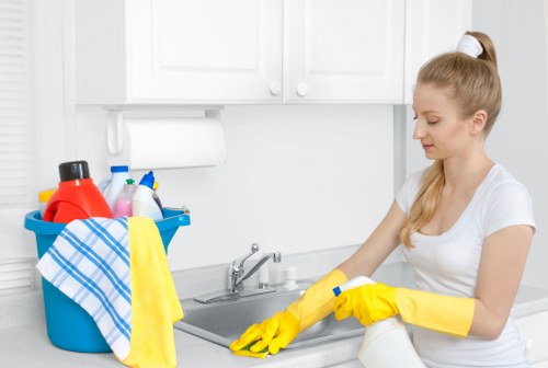 Carpet cleaning team using protective equipment and safety measures